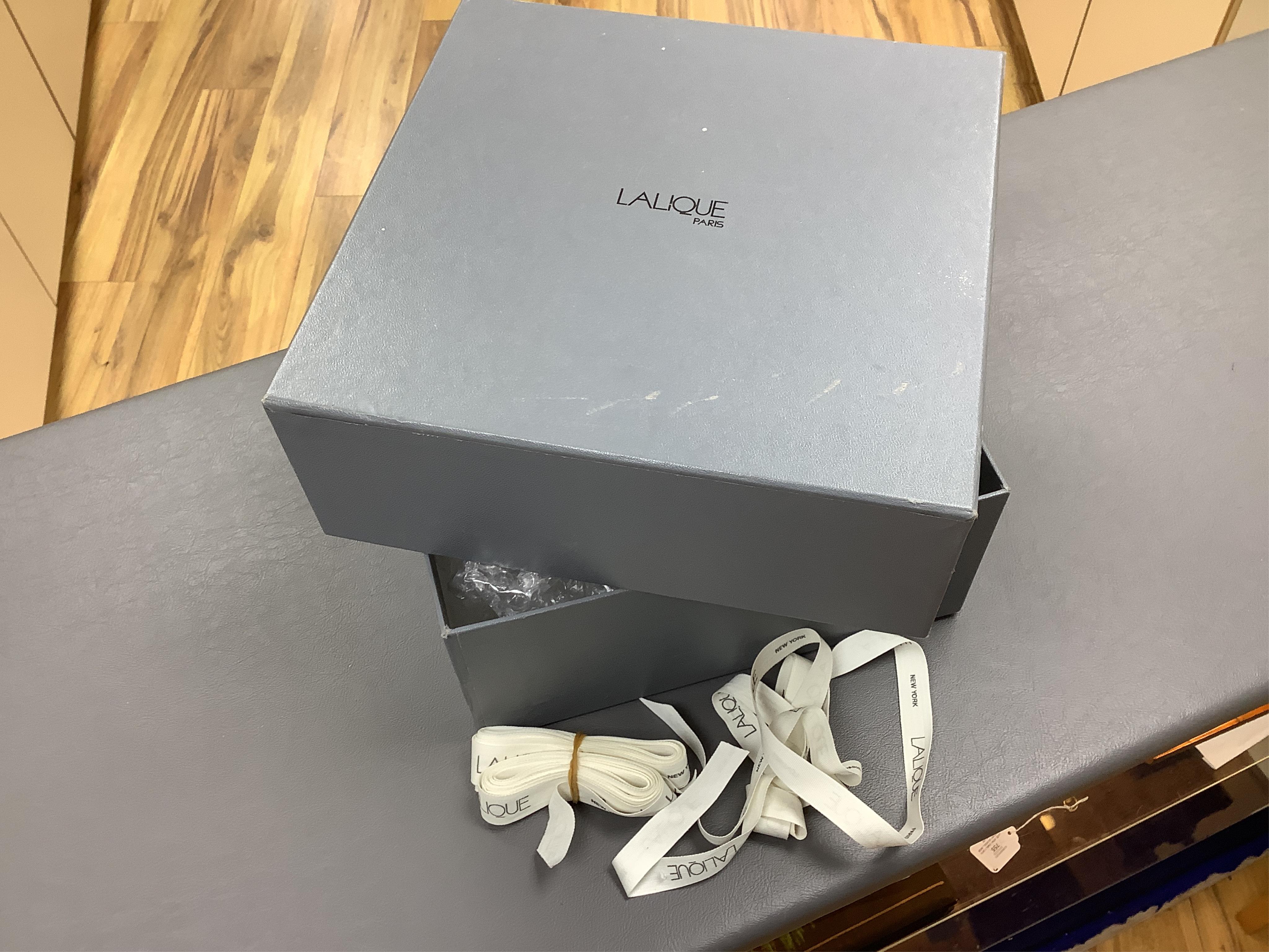 A Lalique glass figure, ‘Simba Lioness’, signed to the base, boxed, 24cm wide